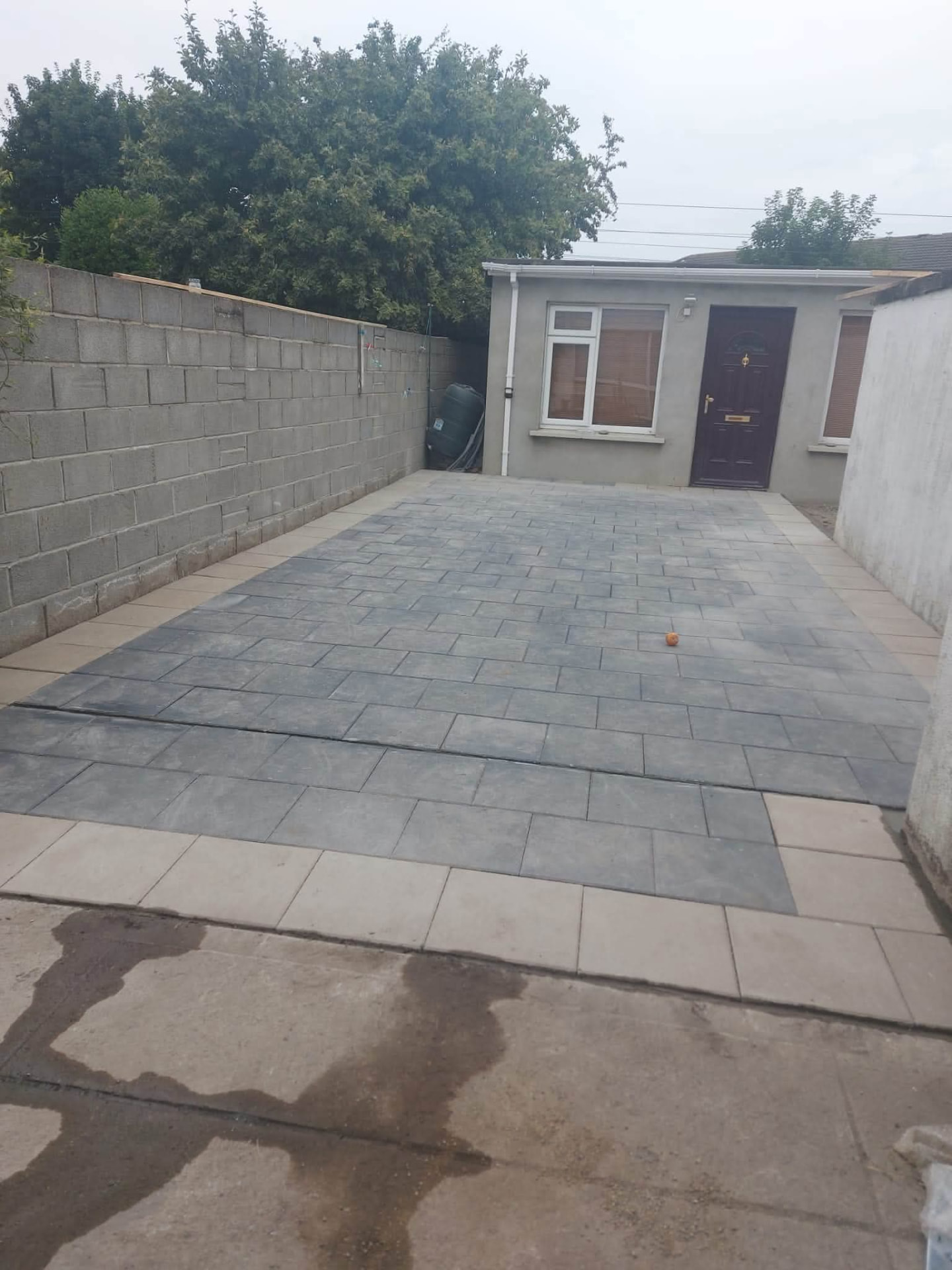 Completed paved courtyard with contrasting border